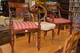 Two stained mahogany open armchairs in Regency style, later 19th century, and a Victorian walnut '