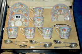 A Royal Worcester cased coffee set, comprising six cups and saucers (af) and five glasses