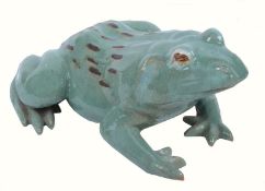 A large glazed ceramic model of a frog, 50cm long approx.