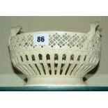 A Leeds pottery creamware two-handled basket, circular, pierced decoration with entwined handles,