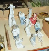 A quantity of Lladro and Nao figures, to include cherubs, ballerina and, with boxes -12