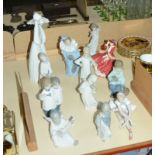 A quantity of Lladro and Nao figures, to include cherubs, ballerina and, with boxes -12