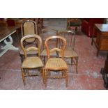 A pair of Victorian mahogany balloon back dining chairs, a bentwood chair and two further bedroom