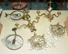 Two pairs of brass and moulded glass mounted ceiling lights and a pair of three branch