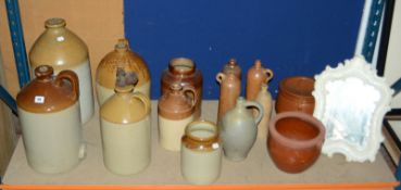 Four large stoneware flagons, six smaller stoneware flagons, stoneware vessels, pots and a modern