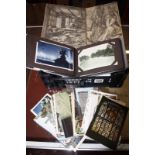 A quantity of assorted 20th Century postcards, some early/ mid in albums and later loose (2 boxes)