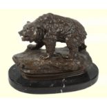 A 20th Century cast bronze bear, on oval plinth base, 16cm high
