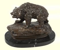 A 20th Century cast bronze bear, on oval plinth base, 16cm high