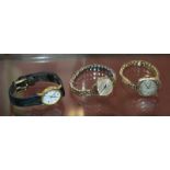 Three ladies wristwatches and an ear stud -4