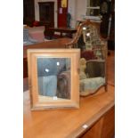 A Queen Anne style walnut framed dressing mirror 78cm high, 51cm wide and a pine framed mirror