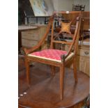 A Sheraton style Edwardian mahogany armchair