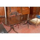 A mahogany twin pedestal dining table in George III style, 221cm extended Best Bid