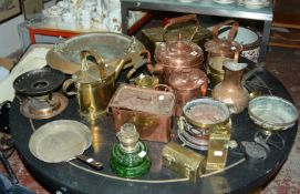 A collection of copper and brassware to include copper kettles, a copper lidded vessel, a pierced