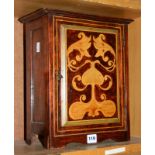 A 20th Century mahogany wall cabinet with stained wooden door, painted marquetry design, 35.5cm
