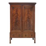 A late George III flame mahogany cupboard, circa 1800 and later, the caddy topped dentil cornice