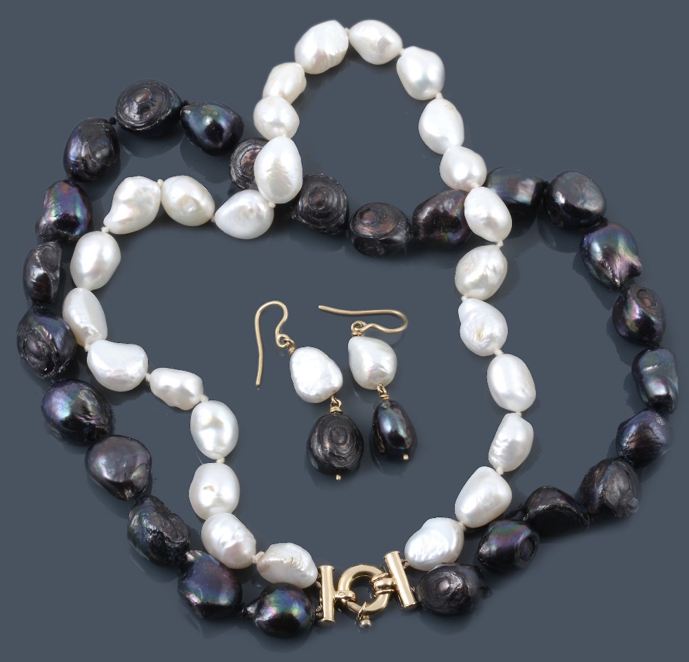 A black and white cultured freshwater pearl necklace and ear pendents  A black and white cultured