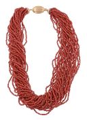 A multi strand coral necklace, the multiple strands of coral to a polished...  A multi strand