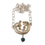 A silver gilt pendant by Elvi Ratti, designed as coiled panther  A silver gilt pendant by Elvi