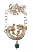 A silver gilt pendant by Elvi Ratti, designed as coiled panther  A silver gilt pendant by Elvi