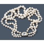 A three row cultured pearl necklace, the rows of forty two, fifty one  A three row cultured pearl