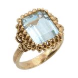 An aquamarine ring, the rectangular shaped aquamarine claw set within a...  An aquamarine ring,