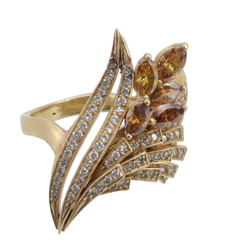 A diamond floral spray dress ring, the pierced panel with eight cut diamond...  A diamond floral