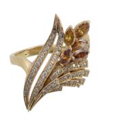 A diamond floral spray dress ring, the pierced panel with eight cut diamond...  A diamond floral