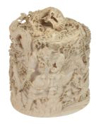 An Ivory Box and Cover,   formed from a section of tusk and carved in deep relief with two heroic