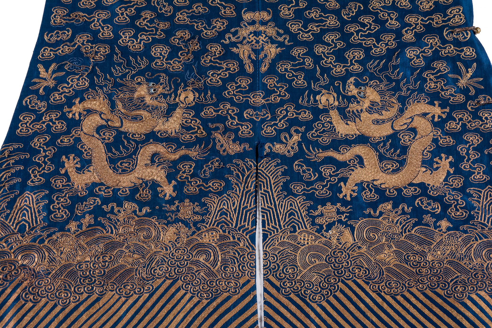 A blue gauze court  dragon robe , jifu, 19th century   , finely worked in couched gilt thread - Image 4 of 6