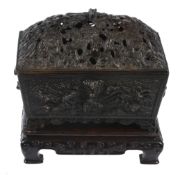 A bronze incense burner  , of rectangular shape, the sides cast with animals amongst foaming waves,