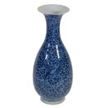 A Chinese blue and white vase  , of slender baluster form with trumpet neck, painted with   ho-ho