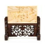 A miniature ivory screen for the scholar s table, 19th century  , finely carved with figures amid