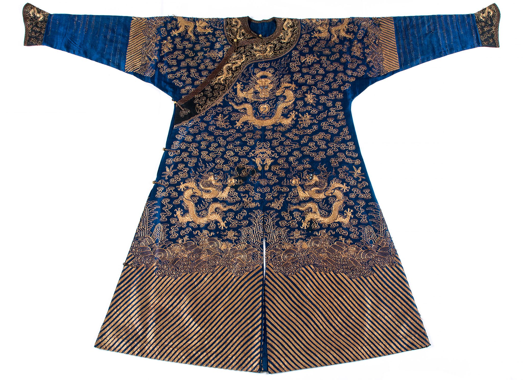 A blue gauze court  dragon robe , jifu, 19th century   , finely worked in couched gilt thread