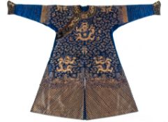 A blue gauze court  dragon robe , jifu, 19th century   , finely worked in couched gilt thread