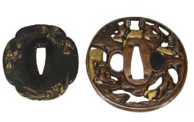 A Copper Soten School Tsuba   of oval form pierced and carved in hikone-bori with sagacious figures