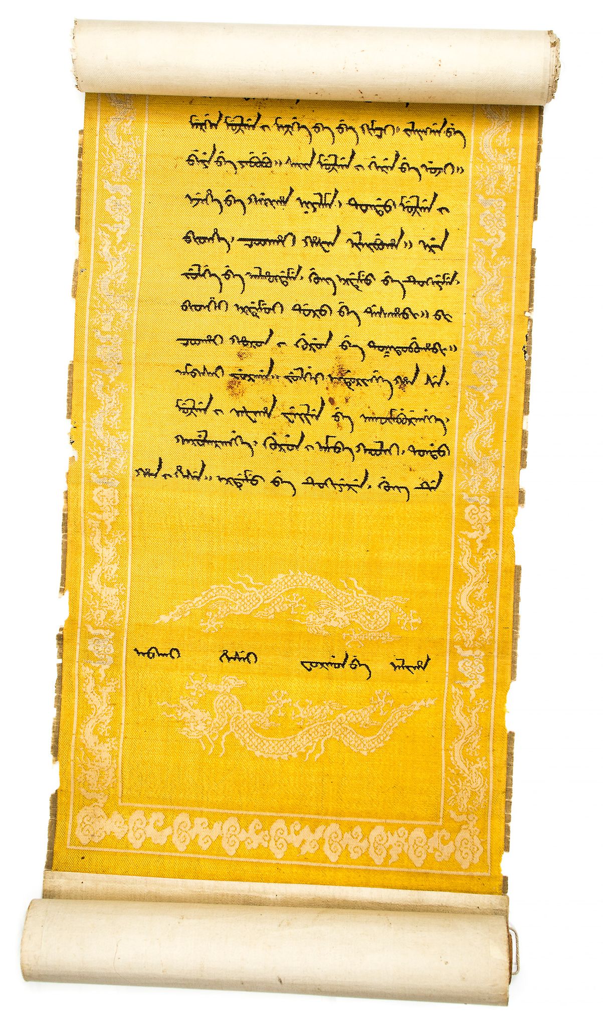 An Imperial edict scroll, Qianlong  , silk brocade woven with a dragon-cloud border and mounted as