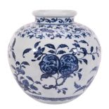 A Chinese ovoid blue and white vase,    painted in early Ming style,  with spryas of fruit,
