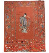 A large red silk ground commemorative hanging, 19th century , embroidered with Magu serving the