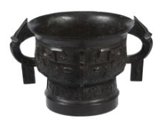 A Chinese bronze Western Zhou style ritual food vessel,  gui  , the body moulded with stylised