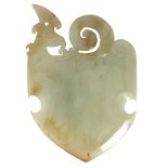 A Chinese archaistic celadon and russet jade axe head  , with phoenix surmount, 14cm 青白玉斧头