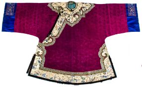 A Han Chinese woman informal coat,  ao  , late Qing  , the cerise coloured damask finely woven with