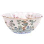 A Chinese  famille rose   fluted bowl, 19th century,   the exterior painted with a dragon and a