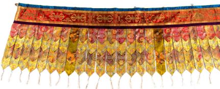 A Tibetan temple pelmet, 18th and 19th century  , consisting of a coral ground silk band