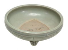 A Longquan celadon tripod censer   raised on three paw supports, the shallow rounded side curve