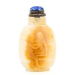 A carved caramel and grey and honey- colour cameo agate snuff bottle  , carved in relief, with an