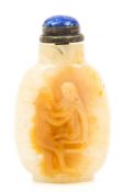 A carved caramel and grey and honey- colour cameo agate snuff bottle  , carved in relief, with an