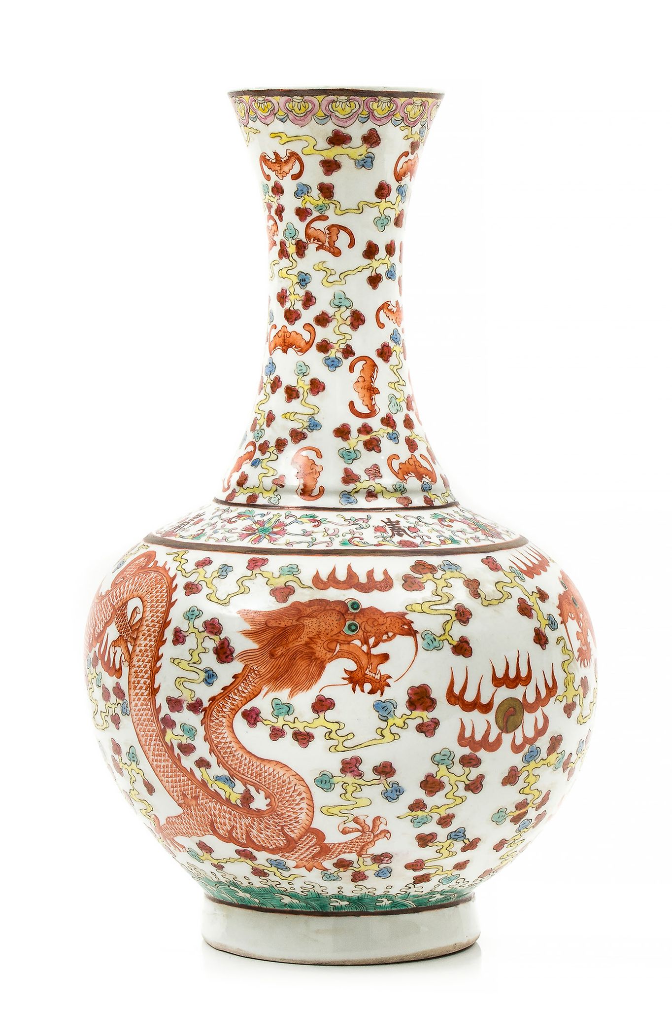 A  famille rose  , iron red vase  , decorated with two dragons contending an flaming pearl, amid