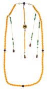 A Mandarin necklace,  chaozhu  , late Qing  , the evenly sized amber beads interspersed with three