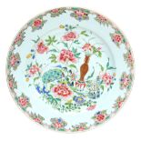 A  famille rose   charger  , Qianlong, painted with a vase of flowers and peony, 35cm diam 清乾隆