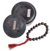 A Buddhist set of prayer beads,  shouchuan  , Qing,   formed with eighteen aloeswood beads,